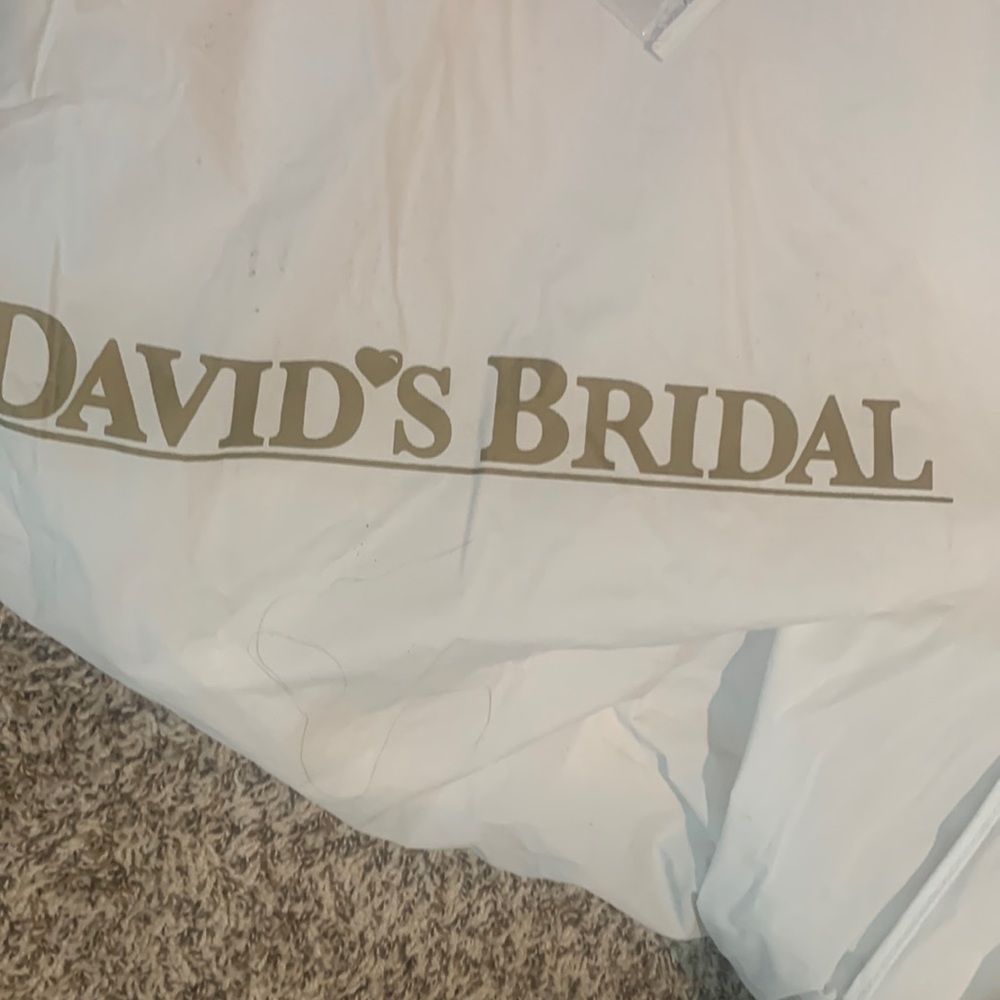 This dress is extremely perfect condition. There’s no dirt on the bottom at all